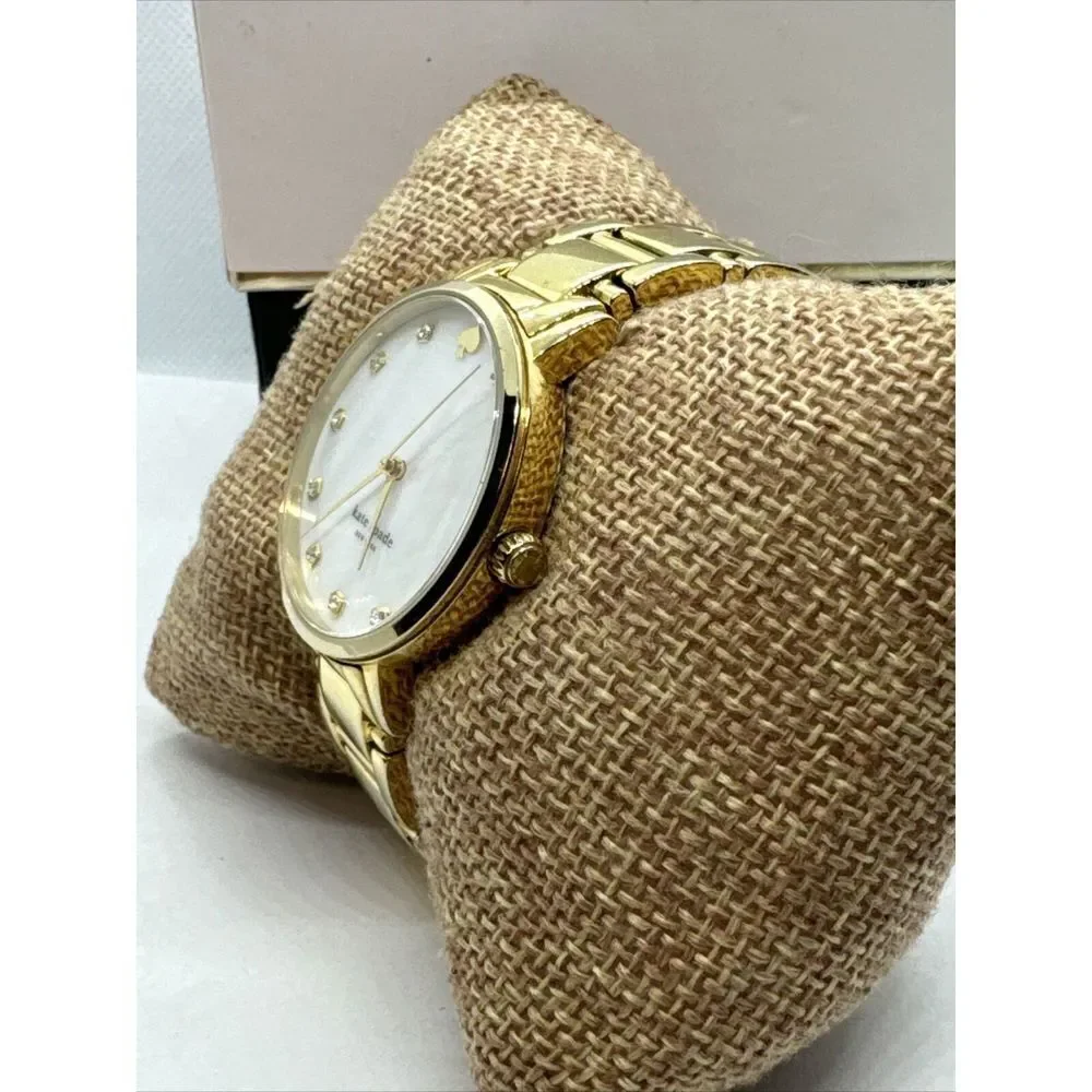 Kate Spade New York 0007 Women's Gold Stainless Steel Analog Dial Watch JNA109